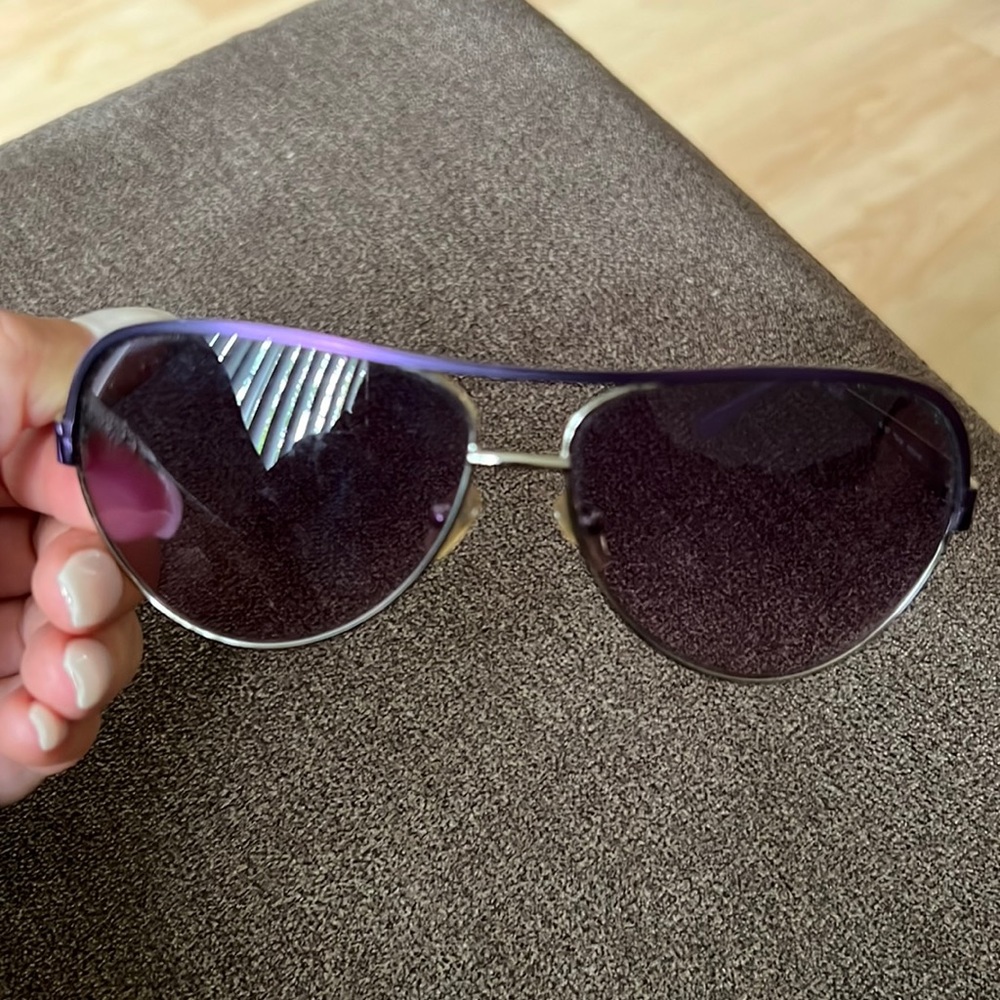 Purple quess glasses